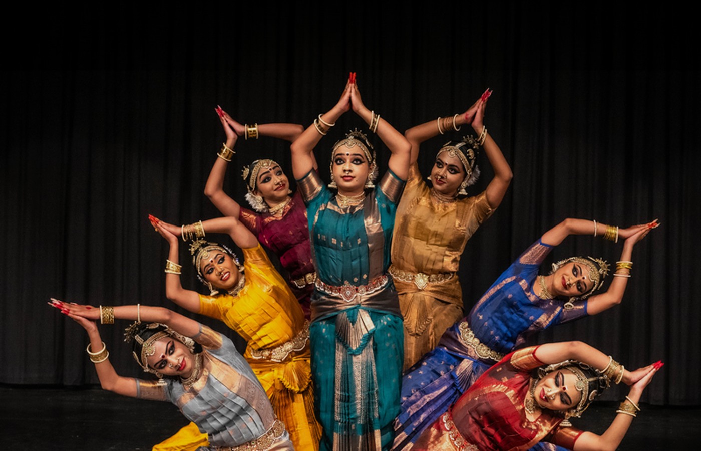 Rasanupavam dancers forming a unified classical dance composition